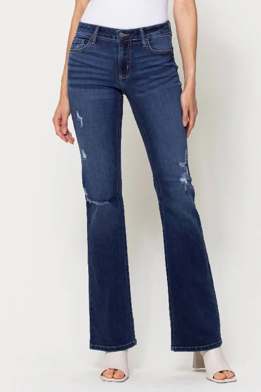 Weekend Shopping Bliss Mid Rise Distressed Flare Jeans In Medium Wash